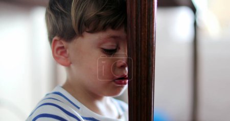 Photo for One sad little boy tearful child feeling displeased - Royalty Free Image