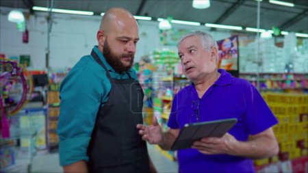 Supermarket Manager Addressing Inventory Issue with Employee, Strict Boss Reprimanding Staff Holding Tablet at Grocery Store, Dispute at Workplace