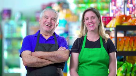 Photo for Joyful Supermarket Employees, Senior Male Manager and Middle-aged Female Worker - Royalty Free Image