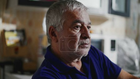 Photo for Hopeless Senior Man in Quiet Despair at Home, Close-Up Depiction of Aging Face Battling Depression and Mental Illness - Royalty Free Image