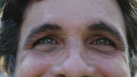 Photo for Male person close-up face looking at camera. 30s man with wrinkles and gree eyes slight smile - Royalty Free Image