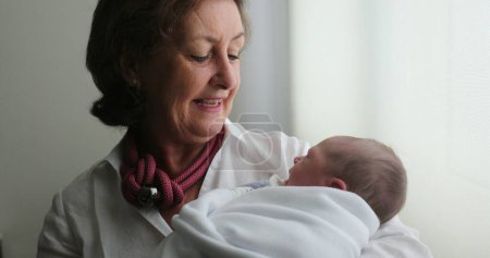 Photo for Grand-mother holding newborn baby - Royalty Free Image