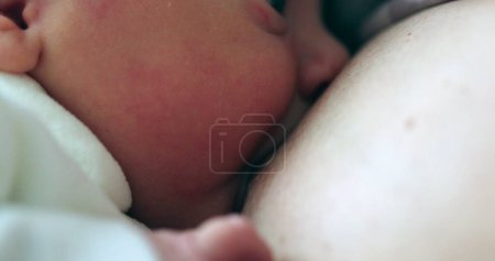 Photo for Newborn first breastfeeding, close-up view - Royalty Free Image