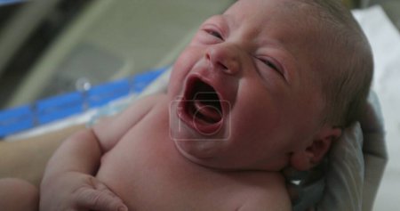Photo for Newborn infant toddler baby first hours of life at hospital - Royalty Free Image