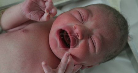 Photo for Infant newborn baby toddler crying at hospital - Royalty Free Image