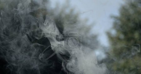 Photo for Smoke captured in high-speed 800 fps outdoors - Royalty Free Image