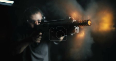 Photo for Front View of Man Firing Shotgun, 800fps Super Slow-Motion, High-Speed Powerful Weapon Shooting - Royalty Free Image