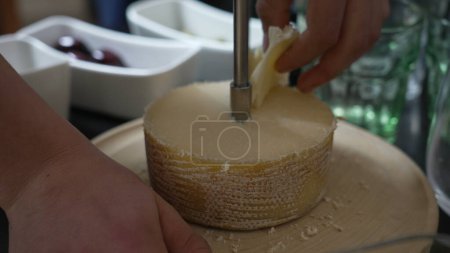 Photo for Close-up of Swiss Tete de Moine Cheese Curling Device - Royalty Free Image