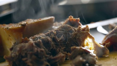 Photo for Macro close-up of hot meat, preparing and cooking meal, steam smoke coming from food - Royalty Free Image