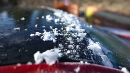 Photo for Morning frost on top of car vehicle after scraping ice from windshield glass - Royalty Free Image