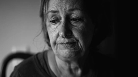 Photo for Senior woman struggling with depression, close-up face of dramatic elderly lady in quiet despair, preoccupied anxious emotion - Royalty Free Image