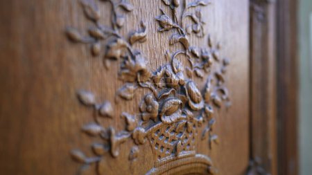 Photo for Handcrafted Floral Intricacy, Ancient Wooden Door Ornamentation. Traditional Door Artistry, Detailed Flower Adornment on Aged Wood - Royalty Free Image