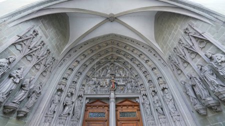 Photo for Fribourg, Switzerland Circa March 2022 - Entrance of Ancient Traditional Saint Nicholas Cathedral, Religious doorway - Royalty Free Image