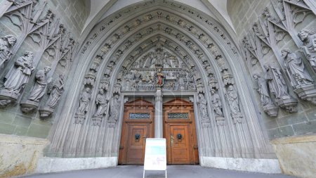 Photo for Fribourg, Switzerland Circa March 2022 - Entrance of Ancient Traditional Saint Nicholas Cathedral, Religious doorway - Royalty Free Image