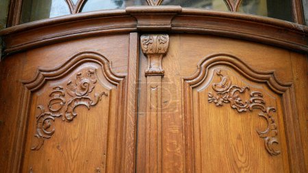 Photo for Ornament detail in antique wooden door. beauty adornment close-up of ancient doorway - Royalty Free Image