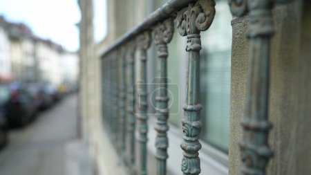 Photo for Aged antique exterior metal bar window gate with adornment and ornamentation - Royalty Free Image