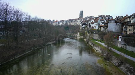 Photo for View of Ancient Swiss city of Fribourg lake with tradtional human scale homes - Royalty Free Image