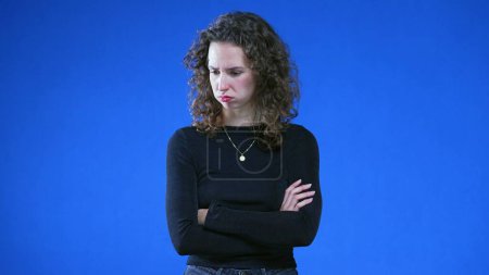 Photo for Displeased Young Woman Showing Disapproval, Blue Backdrop. Upset 20s person feeling annoyance - Royalty Free Image