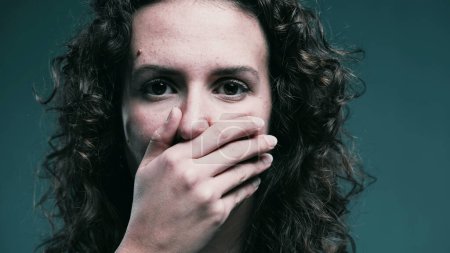 Photo for Scared Woman Covering Mouth in Shock, Stressed Reaction - Royalty Free Image
