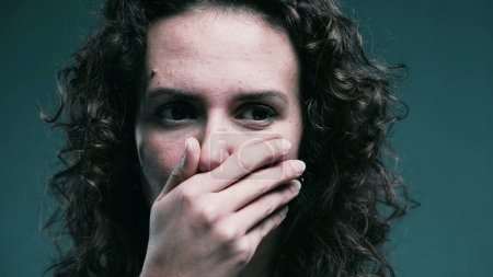 Photo for Scared Woman Covering Mouth in Shock, Stressed Reaction - Royalty Free Image