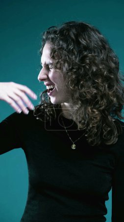 Photo for Excited Woman Gesturing with Hand, Expressing "Oh La La" and "Oof" Emotion, Positive Anticipation - Royalty Free Image