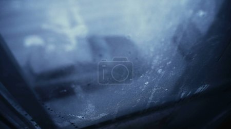 Photo for Winter Window Condensation on Moody Day, Depression Concept. Melancholic theme of person POV stuck at home apartment looking outside - Royalty Free Image