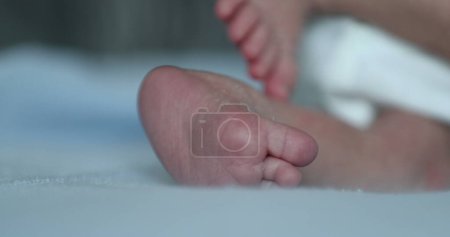 Photo for Baby newborn feet close-up, cute infant feet - Royalty Free Image