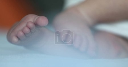 Foto de Close-up of baby feet playing - Imagen libre de derechos