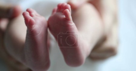 Photo for Baby newborn feet together, infant foot - Royalty Free Image