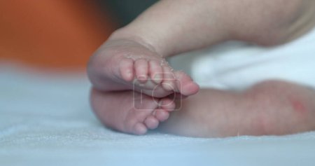 Photo for Baby newborn feet close-up, cute infant feet - Royalty Free Image