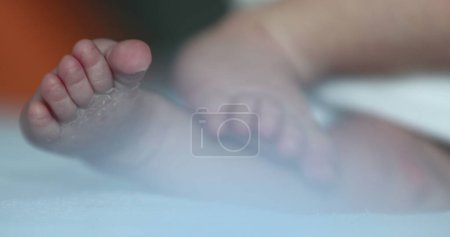 Photo for Close-up of baby feet playing - Royalty Free Image