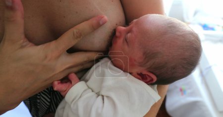 Photo for Mother breastfeeding newborn baby infant - Royalty Free Image