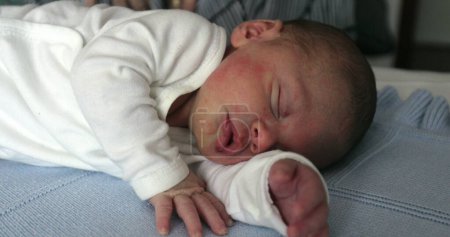 Photo for Newborn baby sleeping in bed - Royalty Free Image