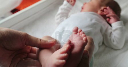 Photo for Newborn baby feet and foot during first week of life - Royalty Free Image