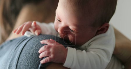 Photo for Mom holding newborn baby son during first days of life - Royalty Free Image
