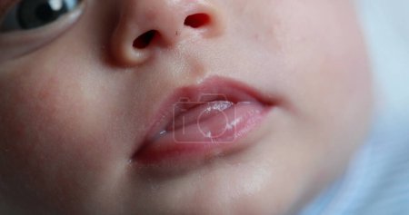 Foto de Macro baby mouth closeup detail face - Imagen libre de derechos