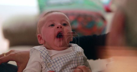 Photo for Tired sleepy newborn baby infant yawning - Royalty Free Image