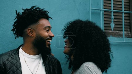 Photo for Joyful African American Couple Sharing Laughter in City, Happy Young Black People Enjoying a Moment Outside, authentic real life laugh and smile - Royalty Free Image