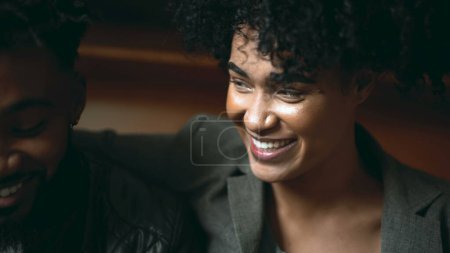 Photo for Close-Up of Joyful South American Black Couple in Their 20s, Authentic Laughter and Smiles, Real-Life Interaction of People of African Descent - Royalty Free Image
