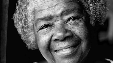 Photo for Happy South American Elderly Lady of African descent smiling at camera in Black and White. Monochrome Portrait of a senior 80s woman with wrinkles and gray hair - Royalty Free Image
