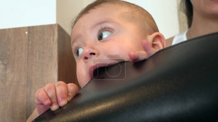 Photo for Adorable baby infant putting object in mouth teething discovering world - Royalty Free Image