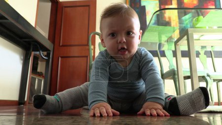Photo for Cute baby toddler at home floor playing alone - Royalty Free Image