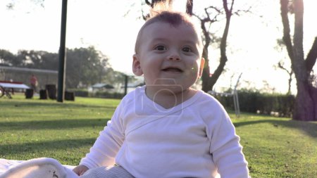 Photo for Happy child baby toddler infant in outdoor park during golden hour - Royalty Free Image