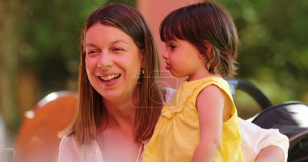 Photo for Candid real life family mother and daughter together - Royalty Free Image