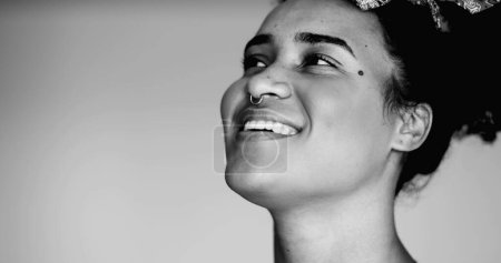 Photo for Happy Black Latina of African Descent Smiling at Camera with Friendly Expression in black and white  Monochromatic Portrait of Brazilian Young Woman - Royalty Free Image