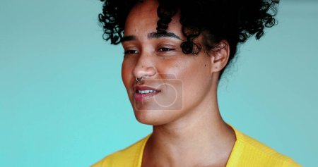 Photo for Annoyed one young black woman rolling eyes feeling bored and upset, close-up face of 20s person of African descent - Royalty Free Image