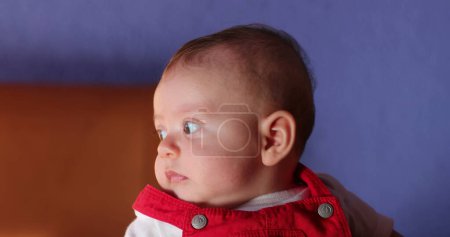Photo for Adorable cute baby boy learning observing the world around - Royalty Free Image