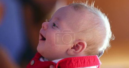 Photo for Profile of happy baby face three month old infant smiling - Royalty Free Image