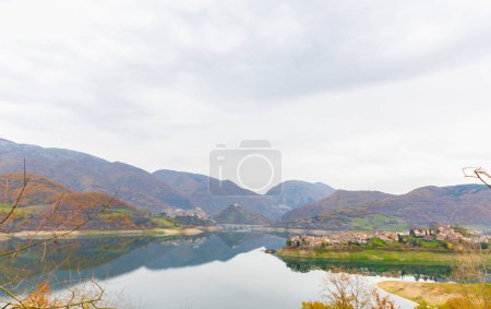 Photo for Panorama of Lake Turano with the villages of Castel di Tora and Colle di Tora overlooking its banks. - Royalty Free Image