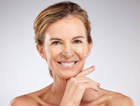 Photo for Woman, beauty and skin, face and anti aging skincare, facial treatment for mature female and natural cosmetics advertising with grey studio background. Elderly model portrait, body care and wellness - Royalty Free Image